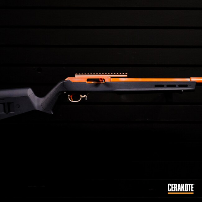 Distressed Bolt Action Rifle Cerakoted Using Hunter Orange