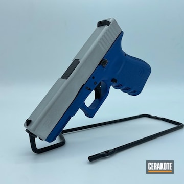 Two Toned Glock Cerakoted Using Ridgeway Blue And Crushed Silver