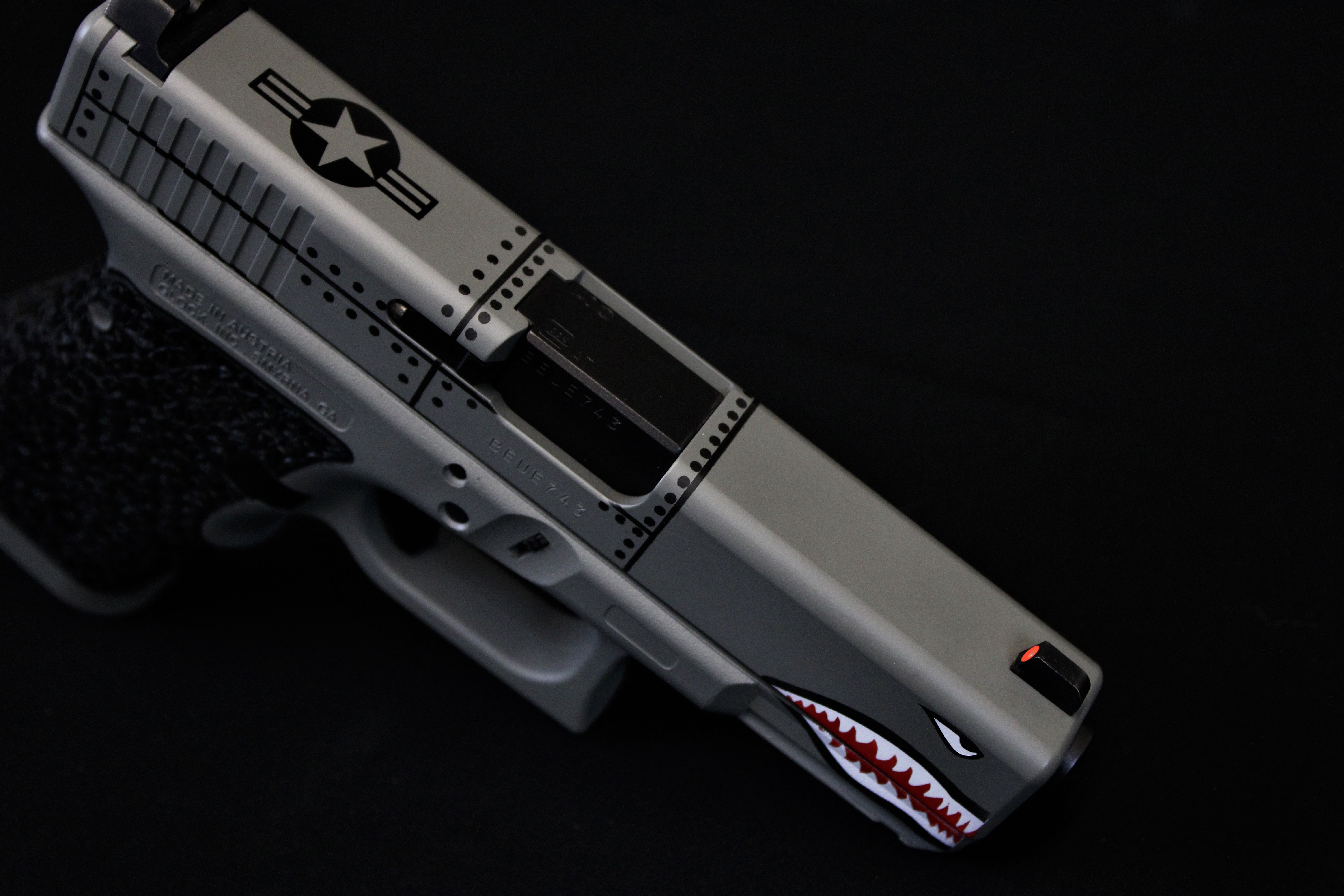 Charizard Glock Tiger Shark Themed Glock Cerakoted using Bright White, Bull Shark Grey ...