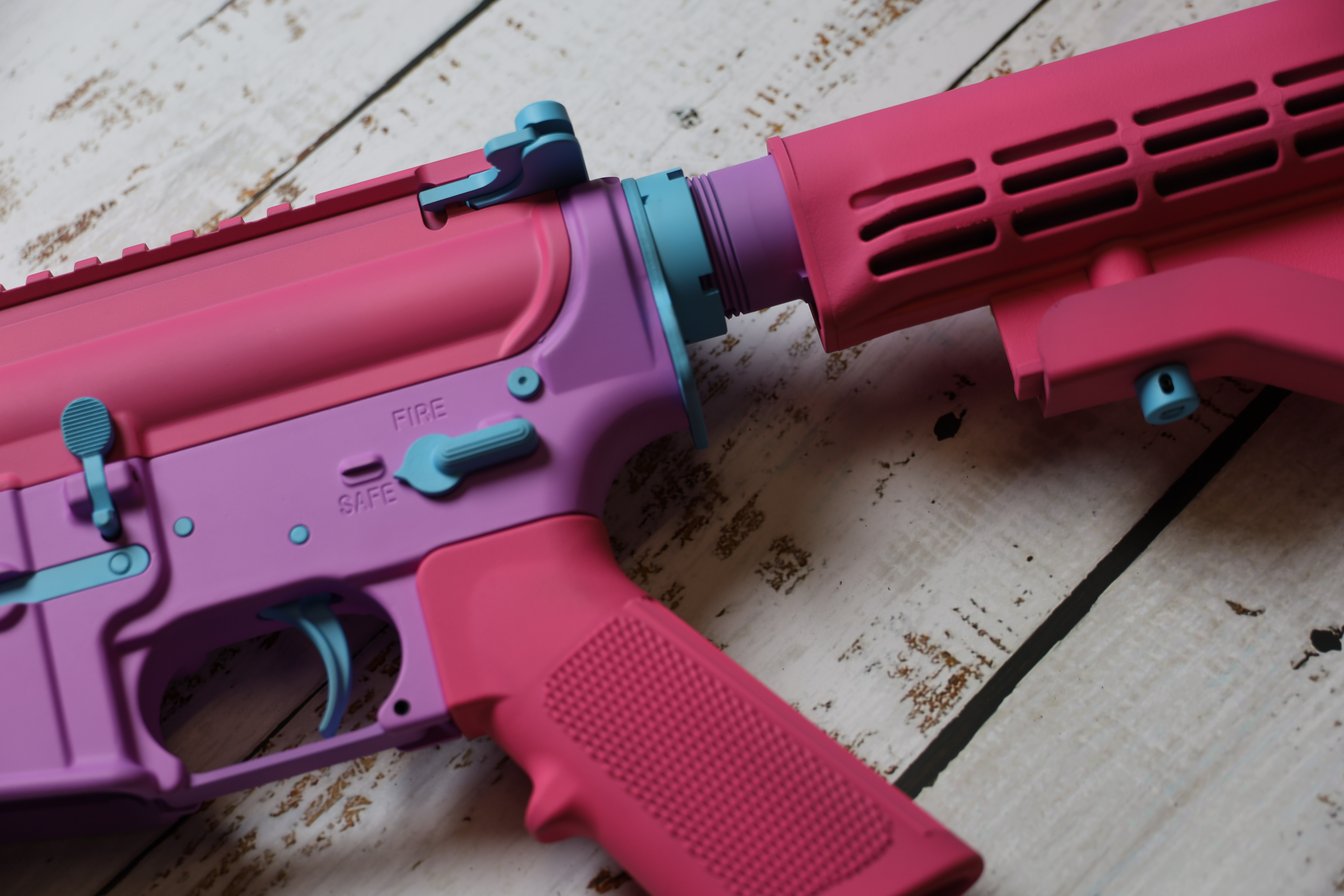Custom AR-15 Build Cerakoted using Blue Raspberry, Prison Pink and ...