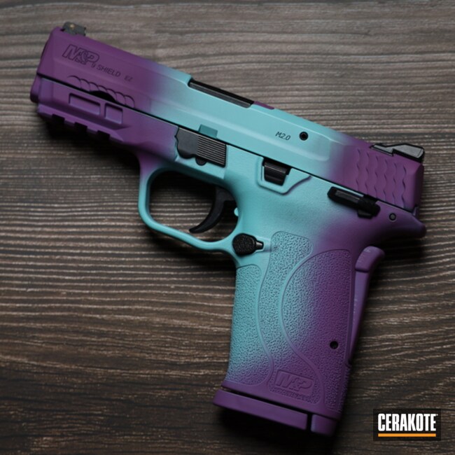 Smith & Wesson M&p Shield Pistol Cerakoted Using Wild Purple And Robin's Egg Blue