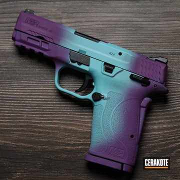 Smith & Wesson M&p Shield Pistol Cerakoted Using Wild Purple And Robin's Egg Blue