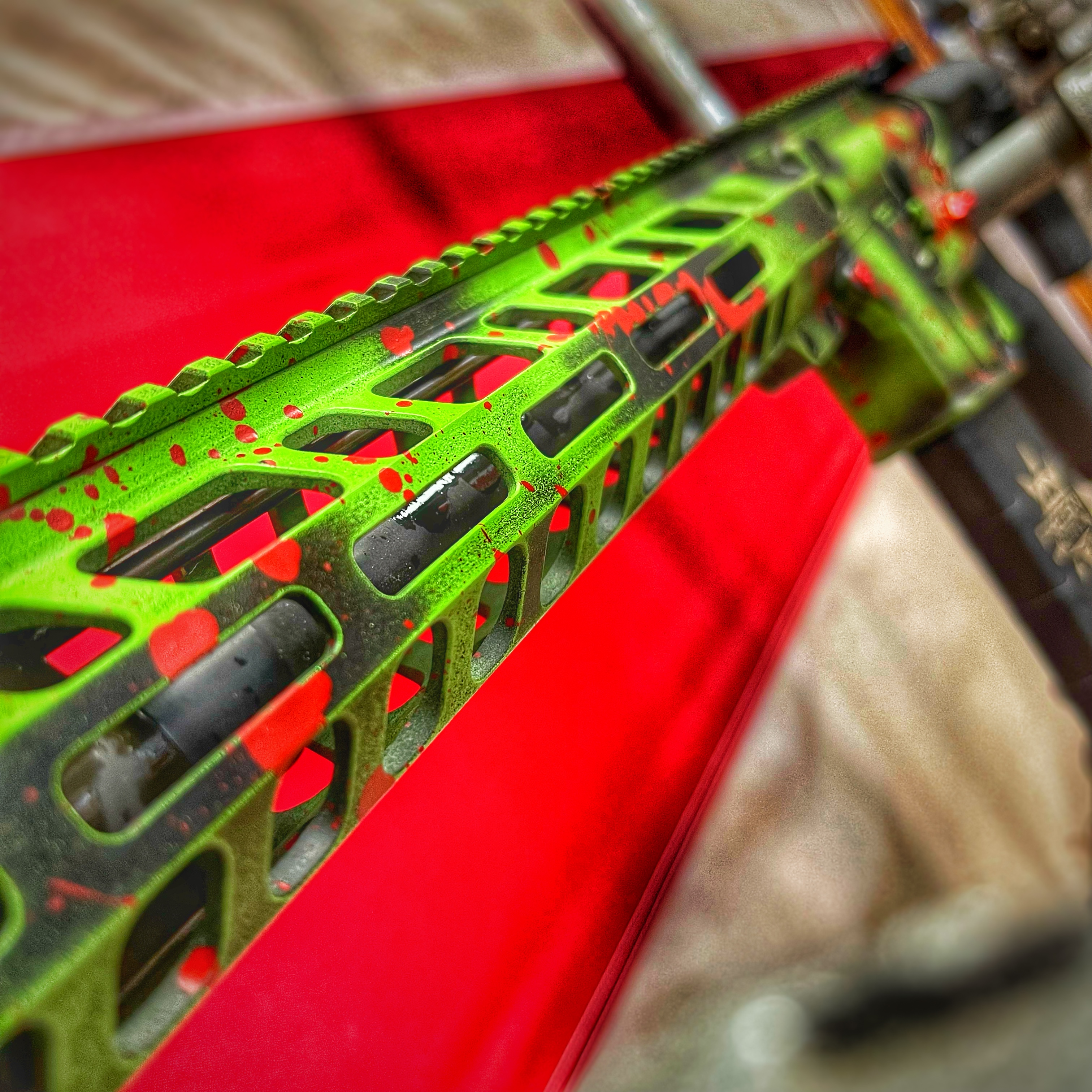 Biohazard Ar AR-15 Cerakoted using Crimson and Zombie Green | Cerakote