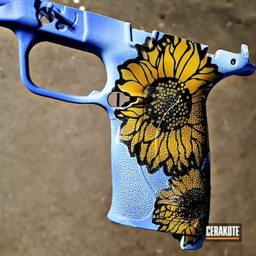 Smith & Wesson M&p Shield Grip Cerakoted Using Hunter Orange, Periwinkle And Desert Sand