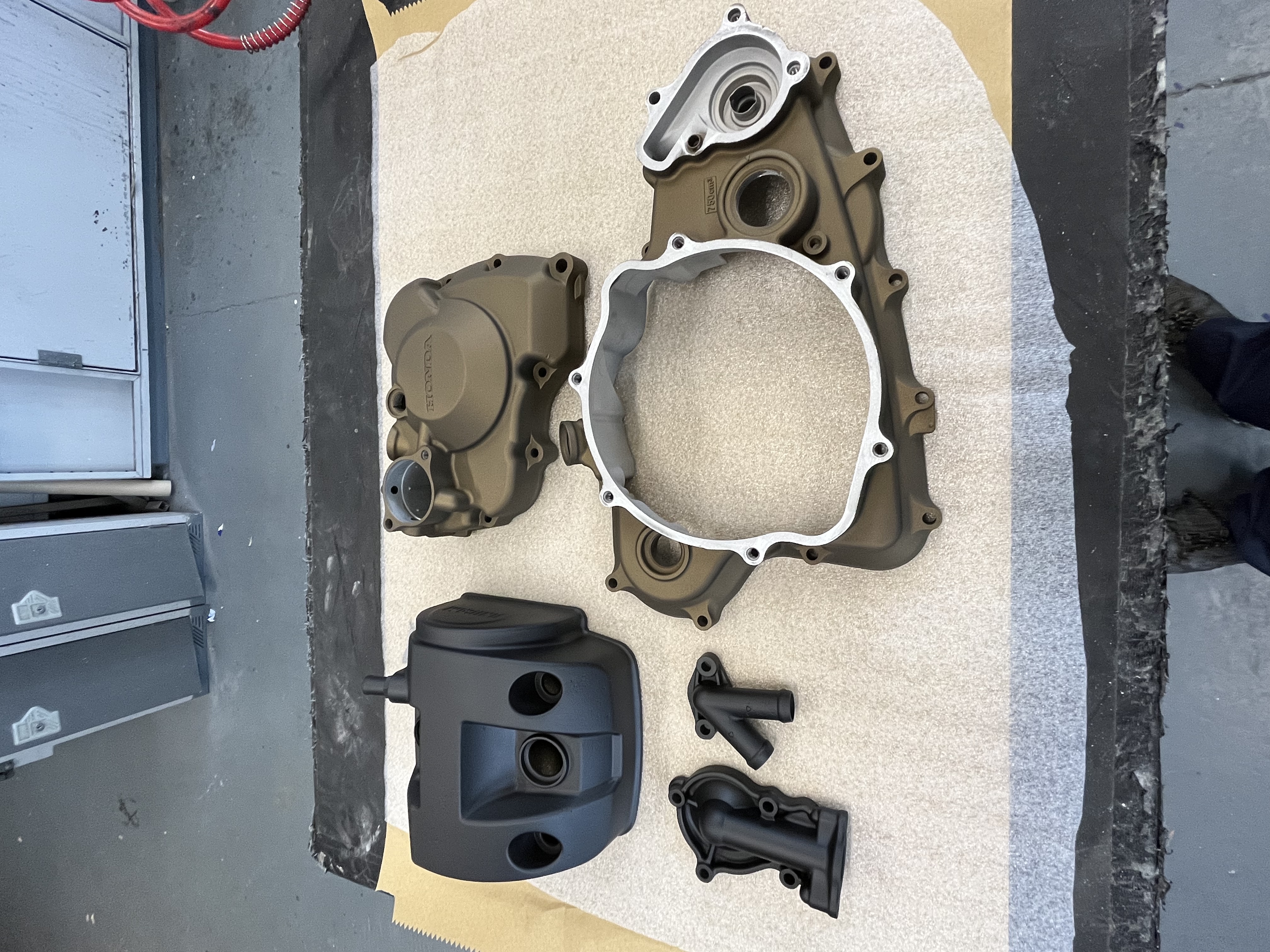 Motorcycle Engine Casing Coating Dirt Bike Engine Casings Cerakoted using Graphite Black and Burnt ...
