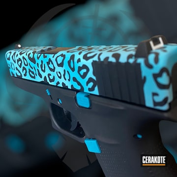 Leopard Print Glock Cerakoted Using Aztec Teal And Graphite Black