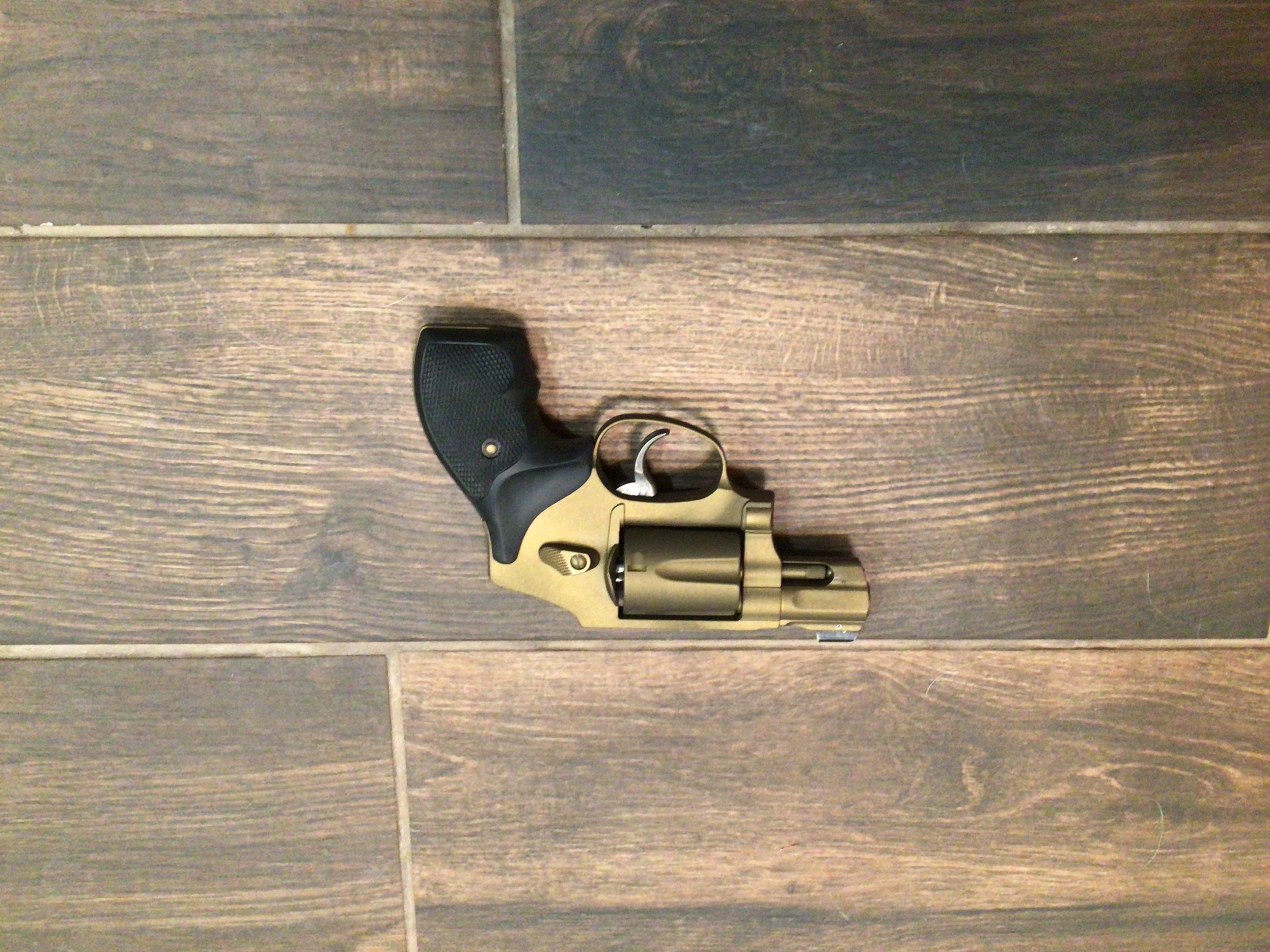 Revolver Cerakoted using Gold | Cerakote