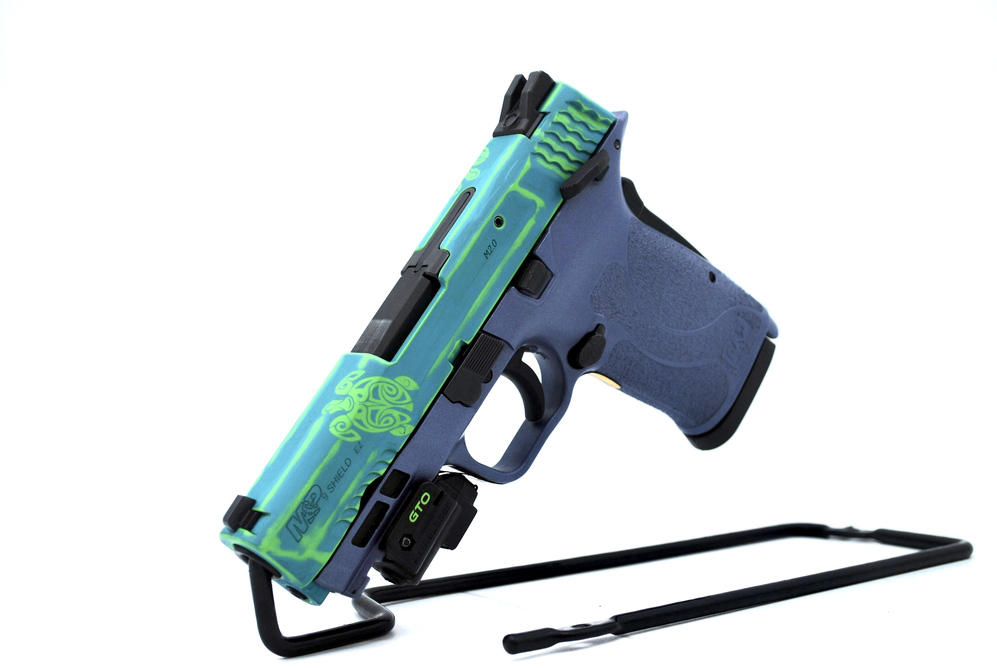Aztec Mamba Custom M&P Shield finished in Aztec Teal and Green Mamba | Cerakote