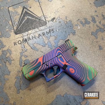 Damascus Glock 43x Cerakoted Using Kel-tec® Navy Blue, Periwinkle And Blood Orange