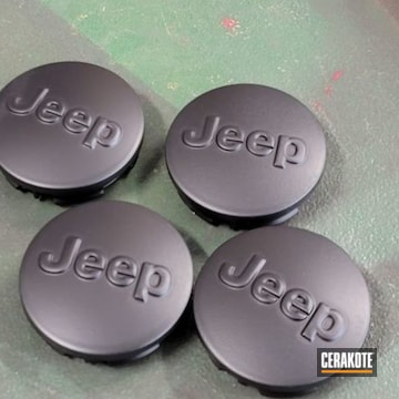 Jeep Wheel Center Caps Cerakoted Using Cerakote Glacier Black