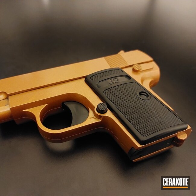 Pistol Cerakoted using Shimmer Aluminum and Gold