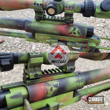 Battleworn Bolt Action Rifle Cerakoted Using Zombie Green, Graphite Black And Firehouse Red