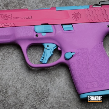 Smith & Wesson M&p Shield Cerakoted Using Blue Raspberry, Prison Pink And Purplexed