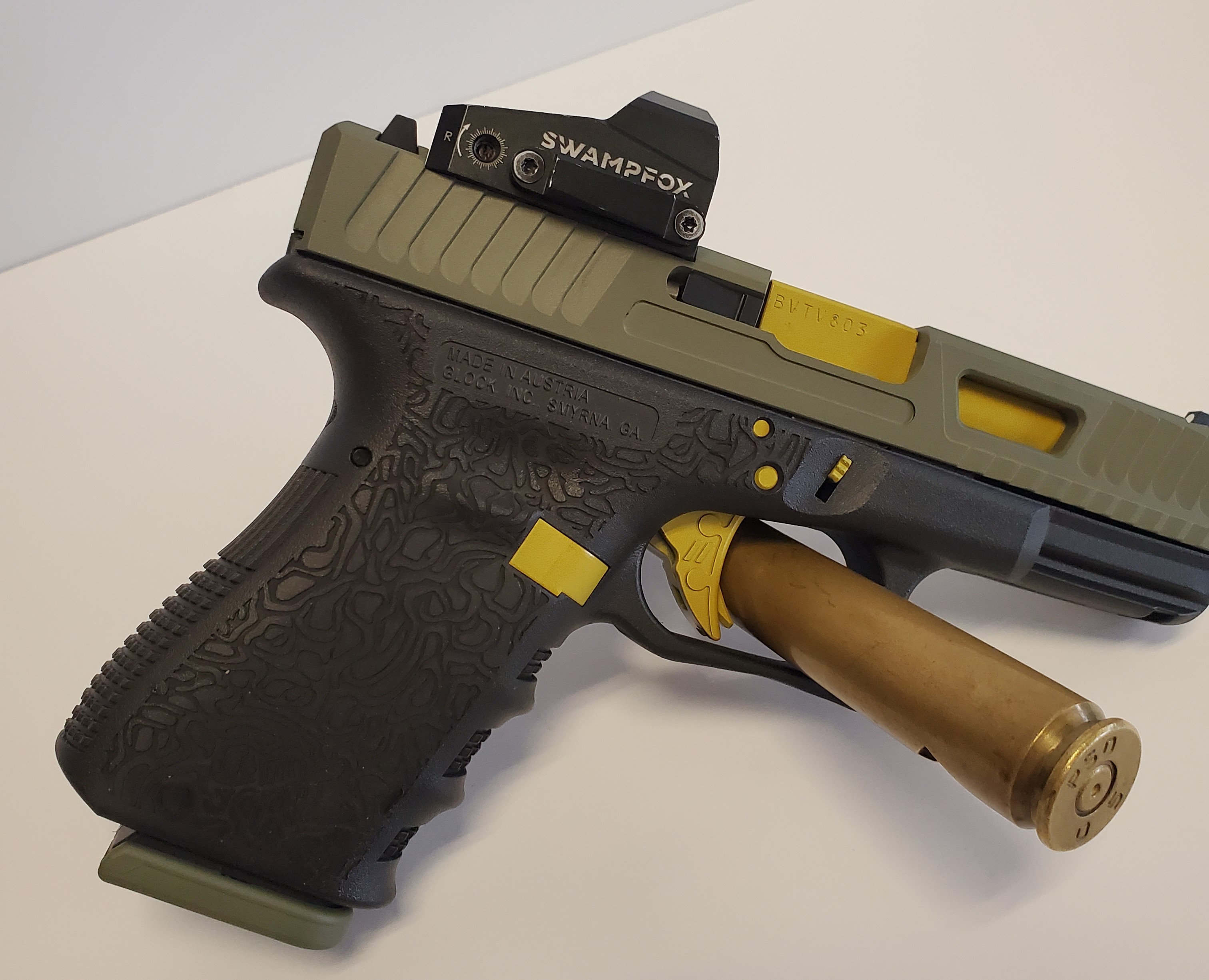 Socom Blue Glock Cerakoted using SOCOM Blue, Forest Green and Corvette Yellow ...
