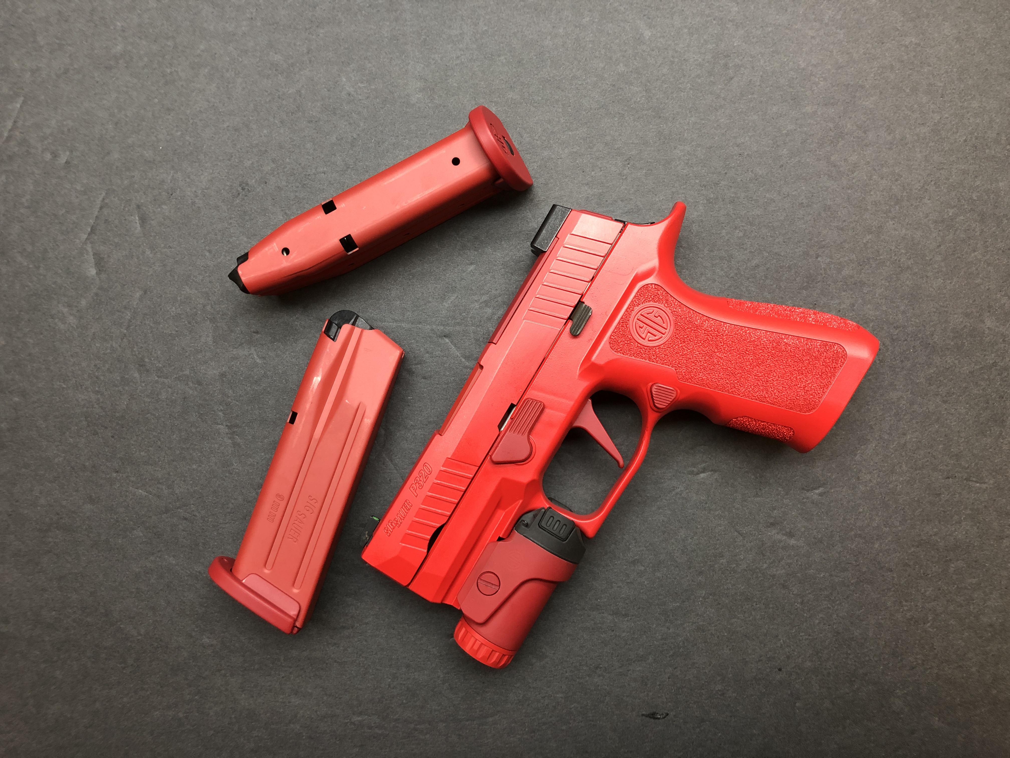 Sig Ruby Sig P320 Cerakoted using USMC Red, Ruby Red and Firehouse Red | Cerakote