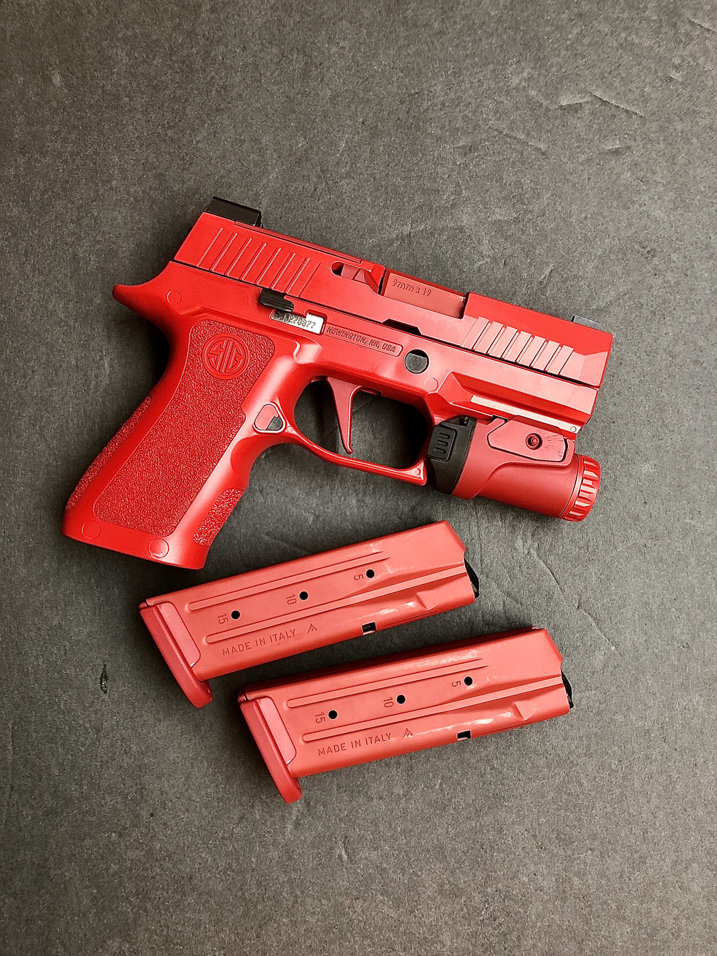 Sig Ruby Sig P320 Cerakoted using USMC Red, Ruby Red and Firehouse Red | Cerakote
