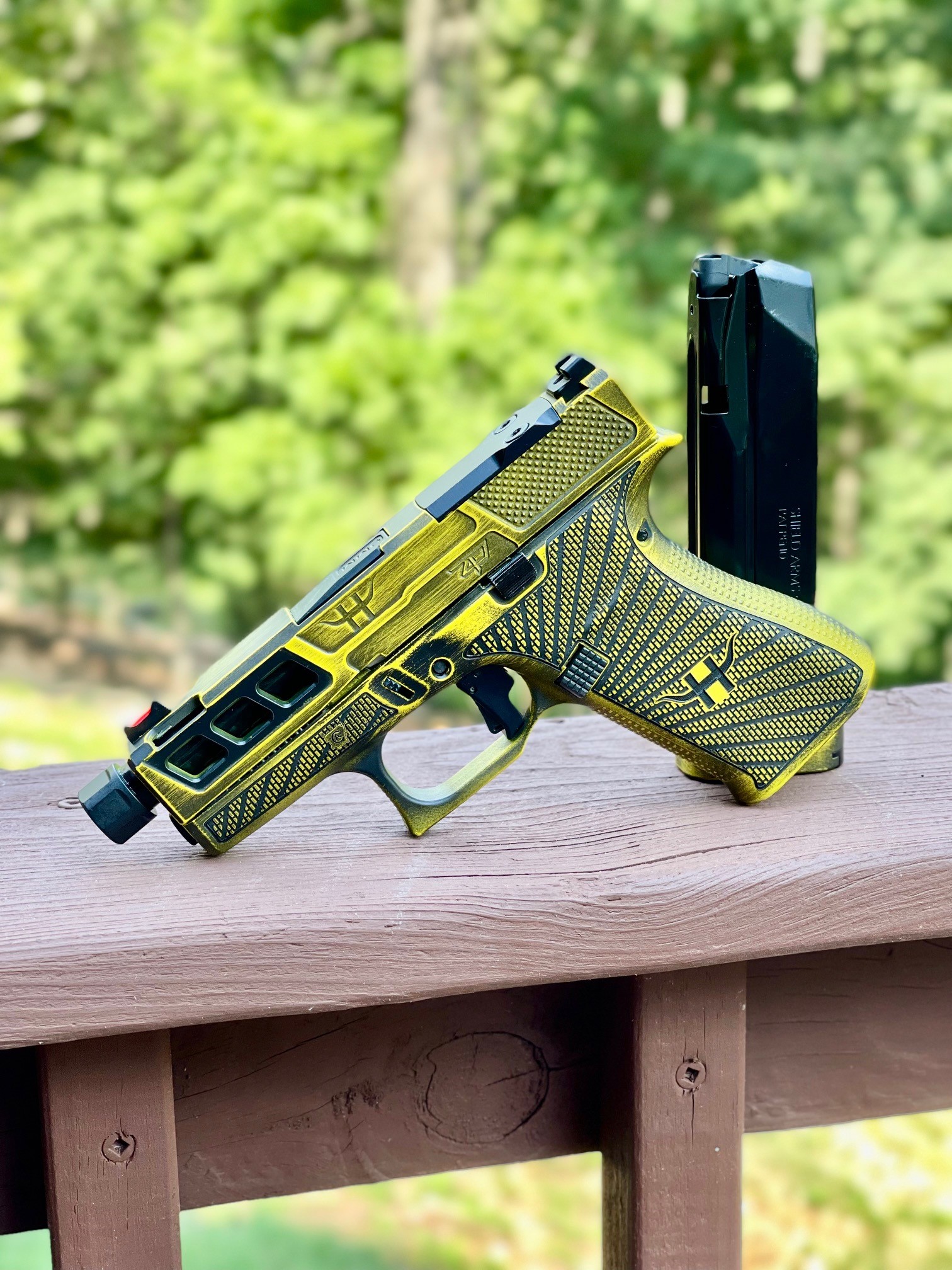 Distressed Glock 43X Cerakoted using Corvette Yellow and Graphite Black ...
