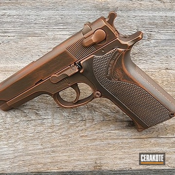 Cerakoted Burnt Bronze And Copper Battleworn Smith & Wesson Pistol