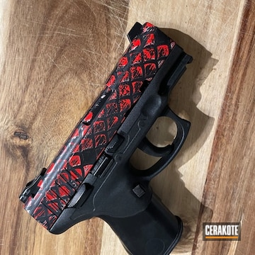 Cerakoted Graphite Black And Stoplight Red Dragon Scale Theme Pistol