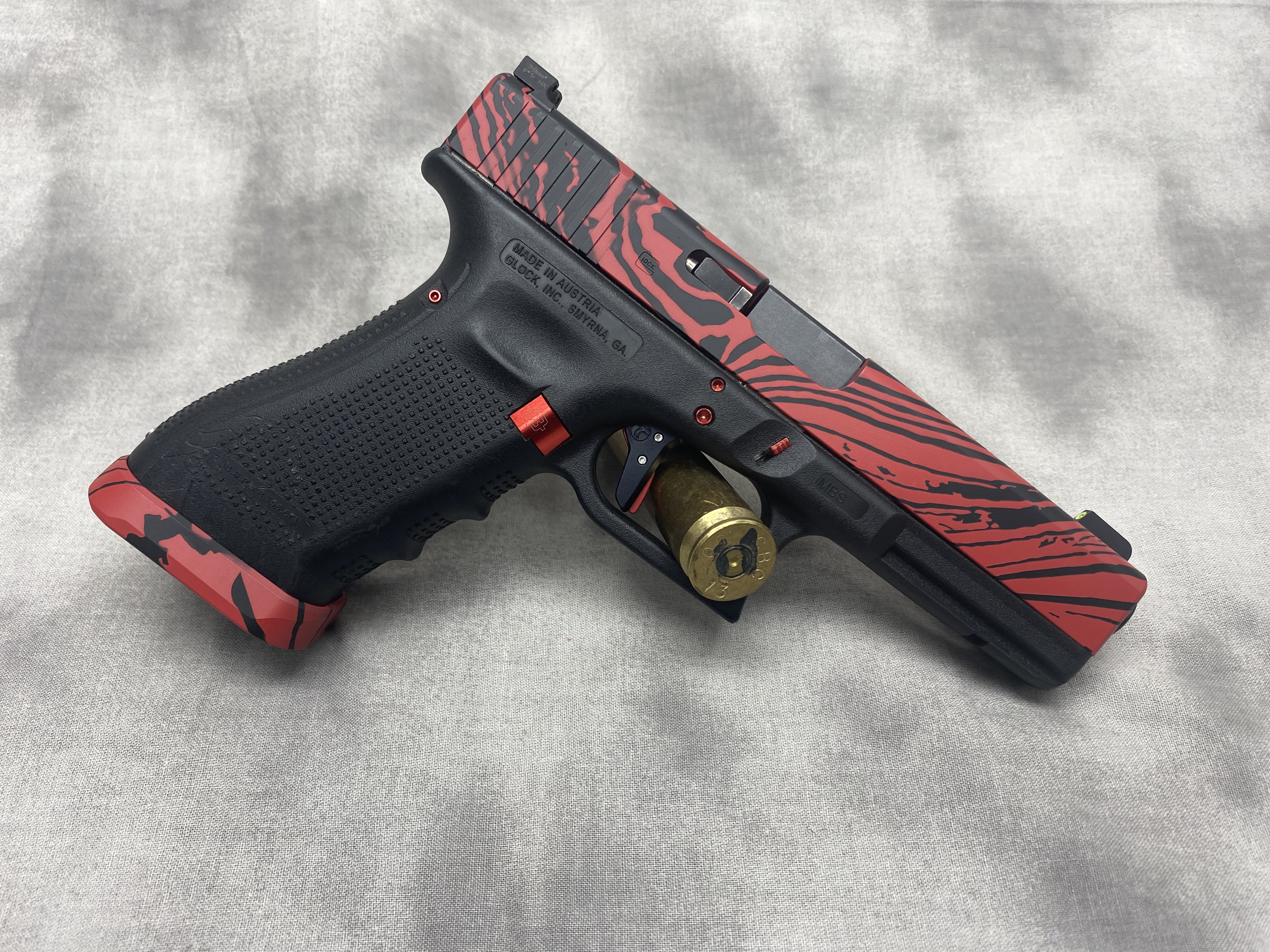 Glock Coating Damascus Glock in Blackout and Fire | Cerakote