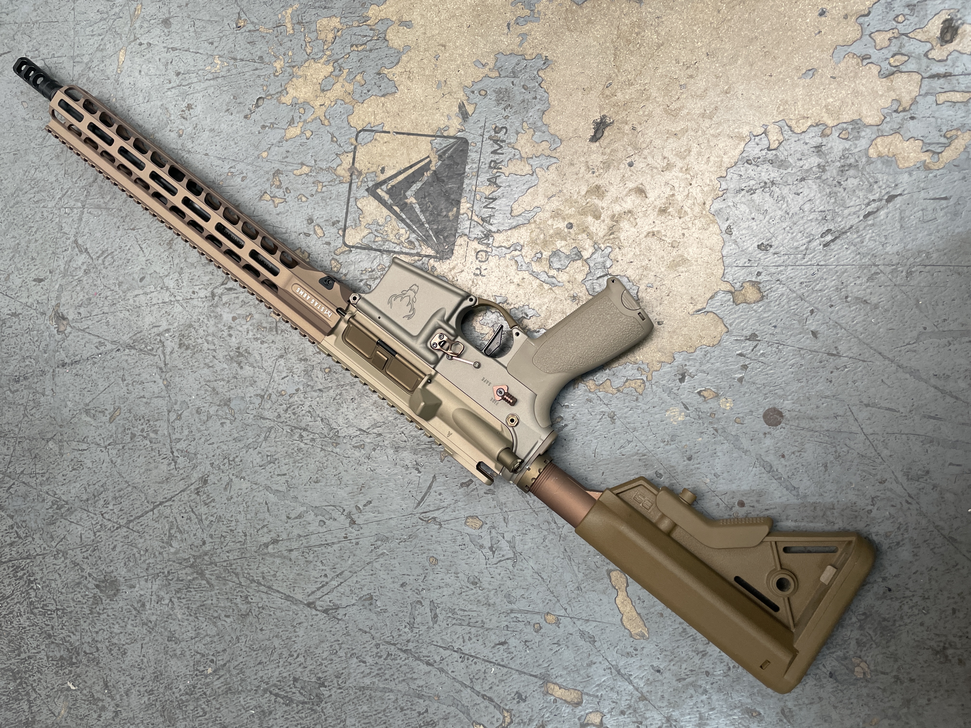 Stag Arms featuring a 20150 Coyote, Titanium and FDE Finish | Cerakote