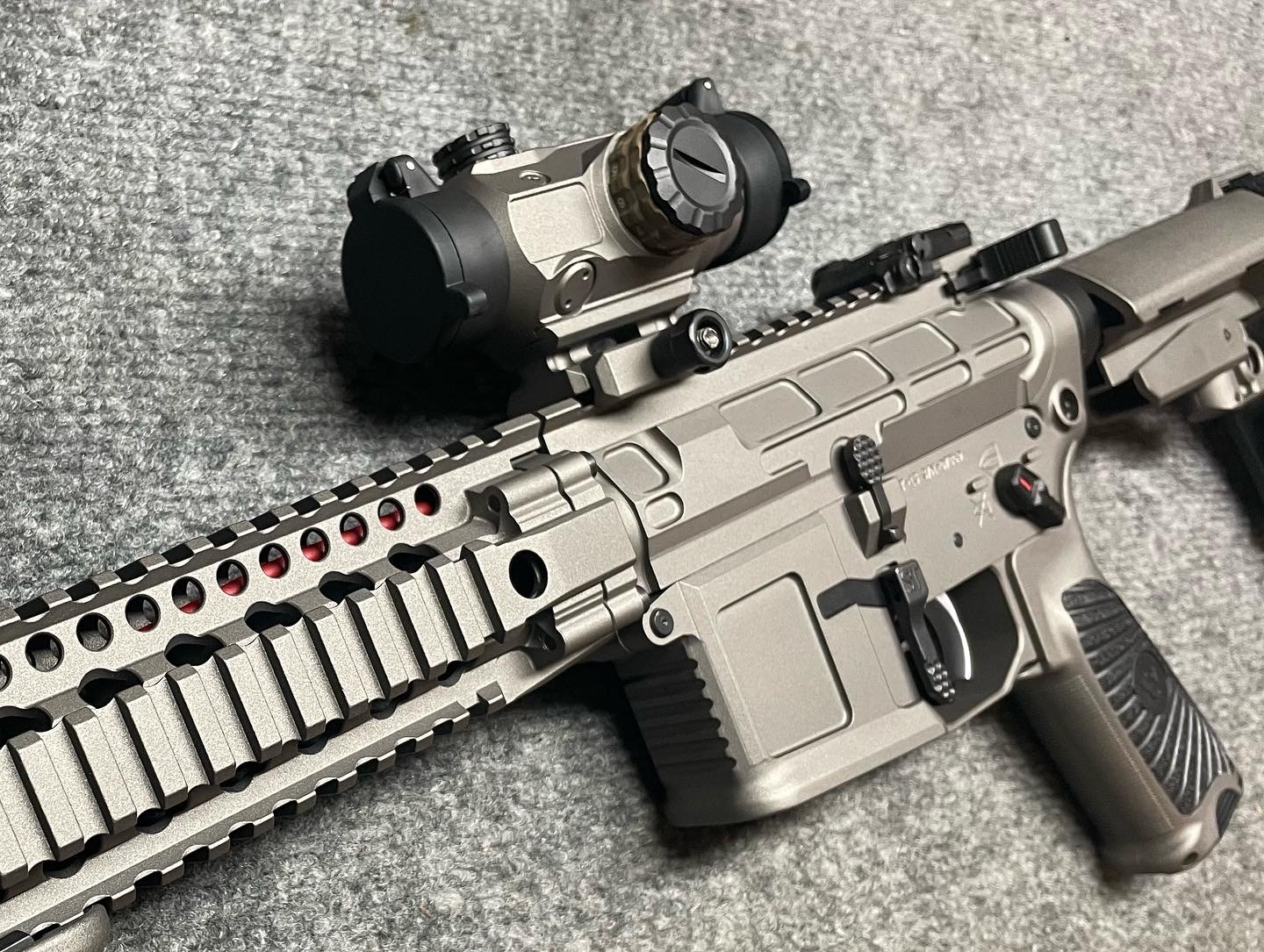 AR Rifle with a Gun Metal Grey, Midnight Bronze and Habanero Red Finish ...