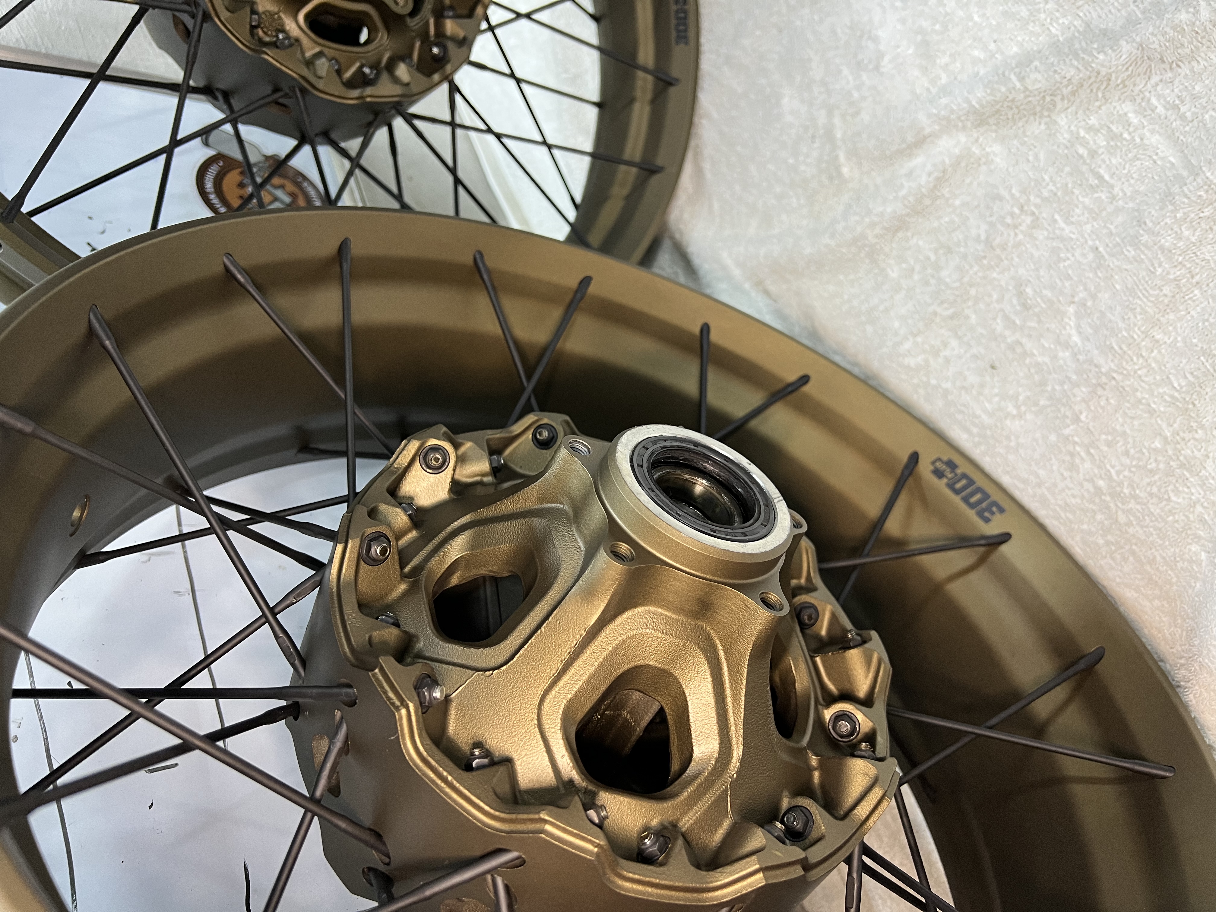 Ducati multistrada wheels customized with Cerakote burnt bronze and ...