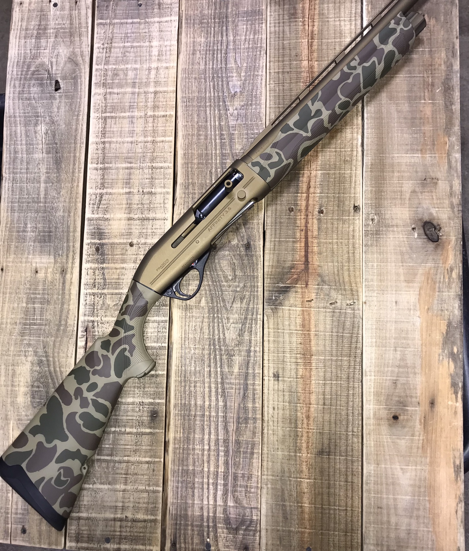 Custom Camo Shotgun with C148, H226 and H148 Cerakote