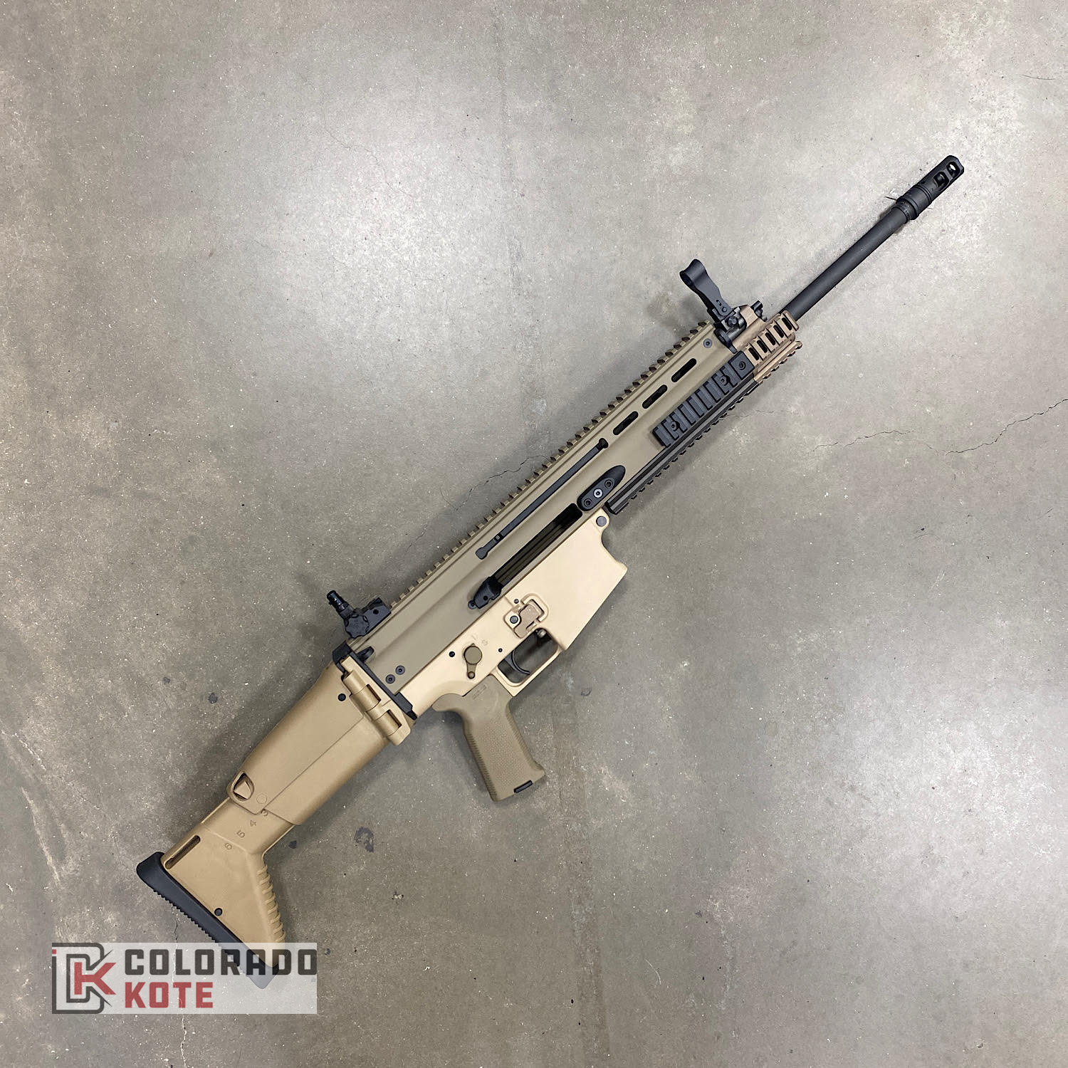 Tactical Rifle coated with a Benelli® Sand and Magpul® Flat Dark Earth ...