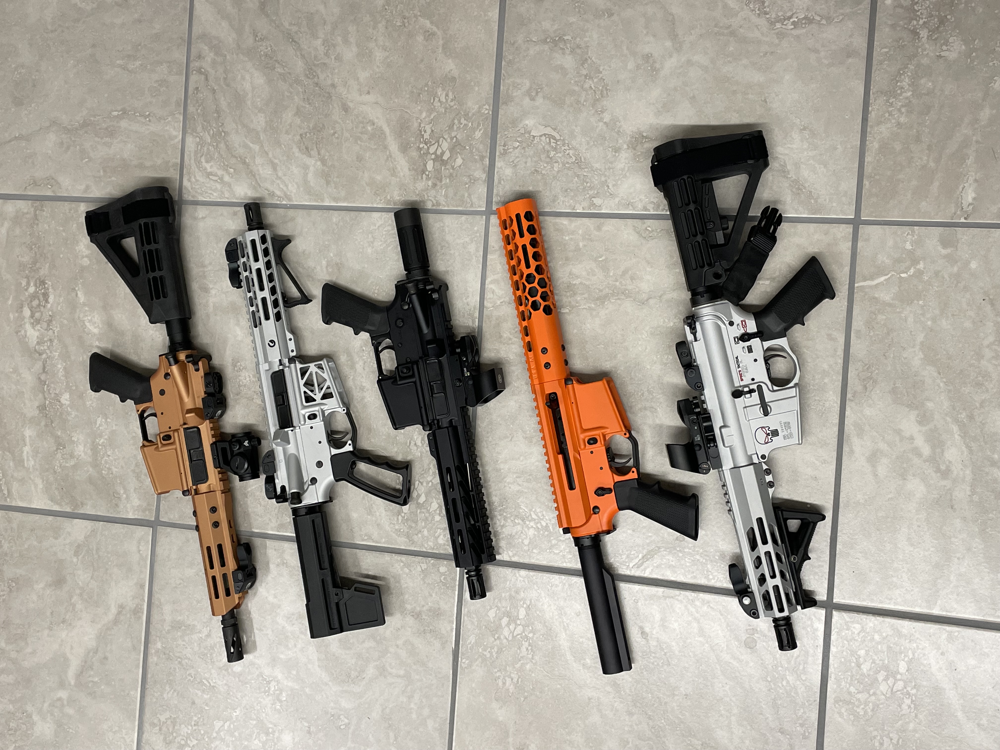 Rifles finished in a Stormtrooper White, Crushed Silver, Hi-vis Orange ...