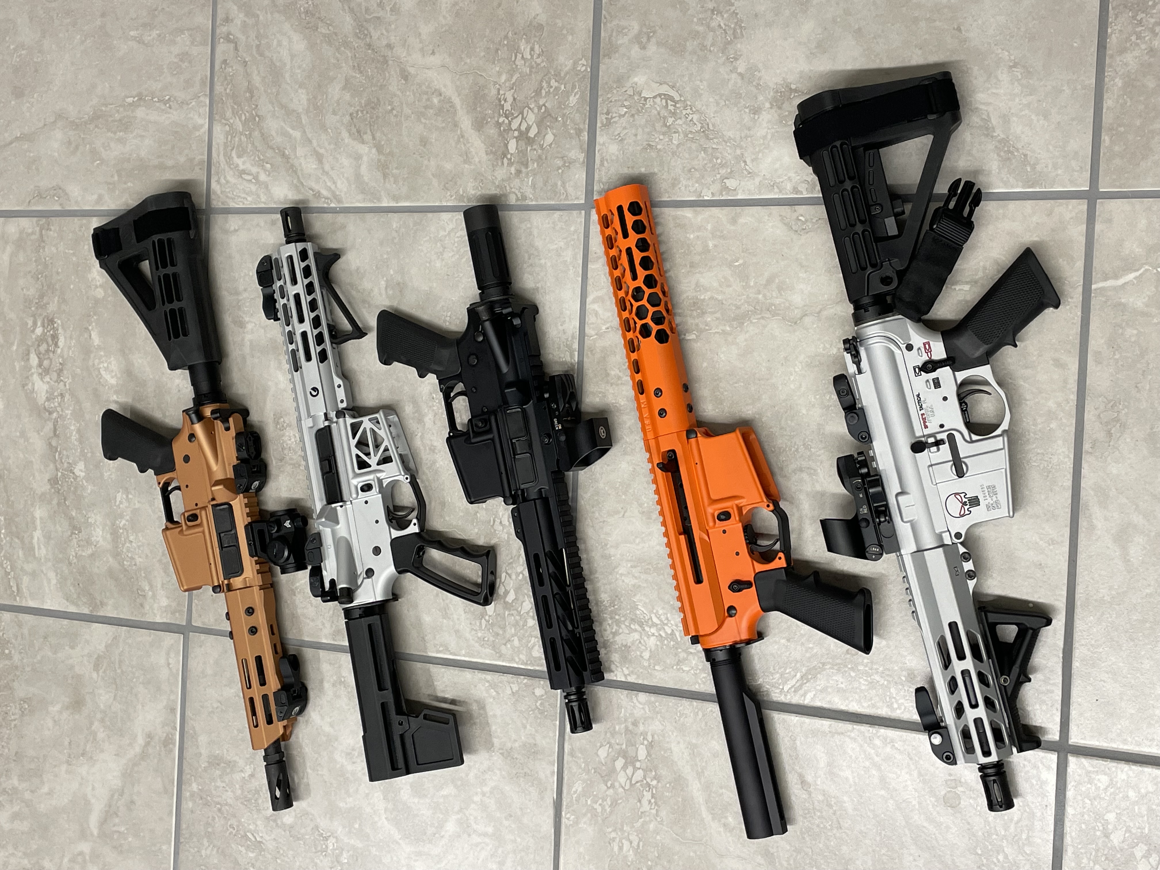 Rifles finished in a Stormtrooper White, Crushed Silver, Hi-vis Orange ...
