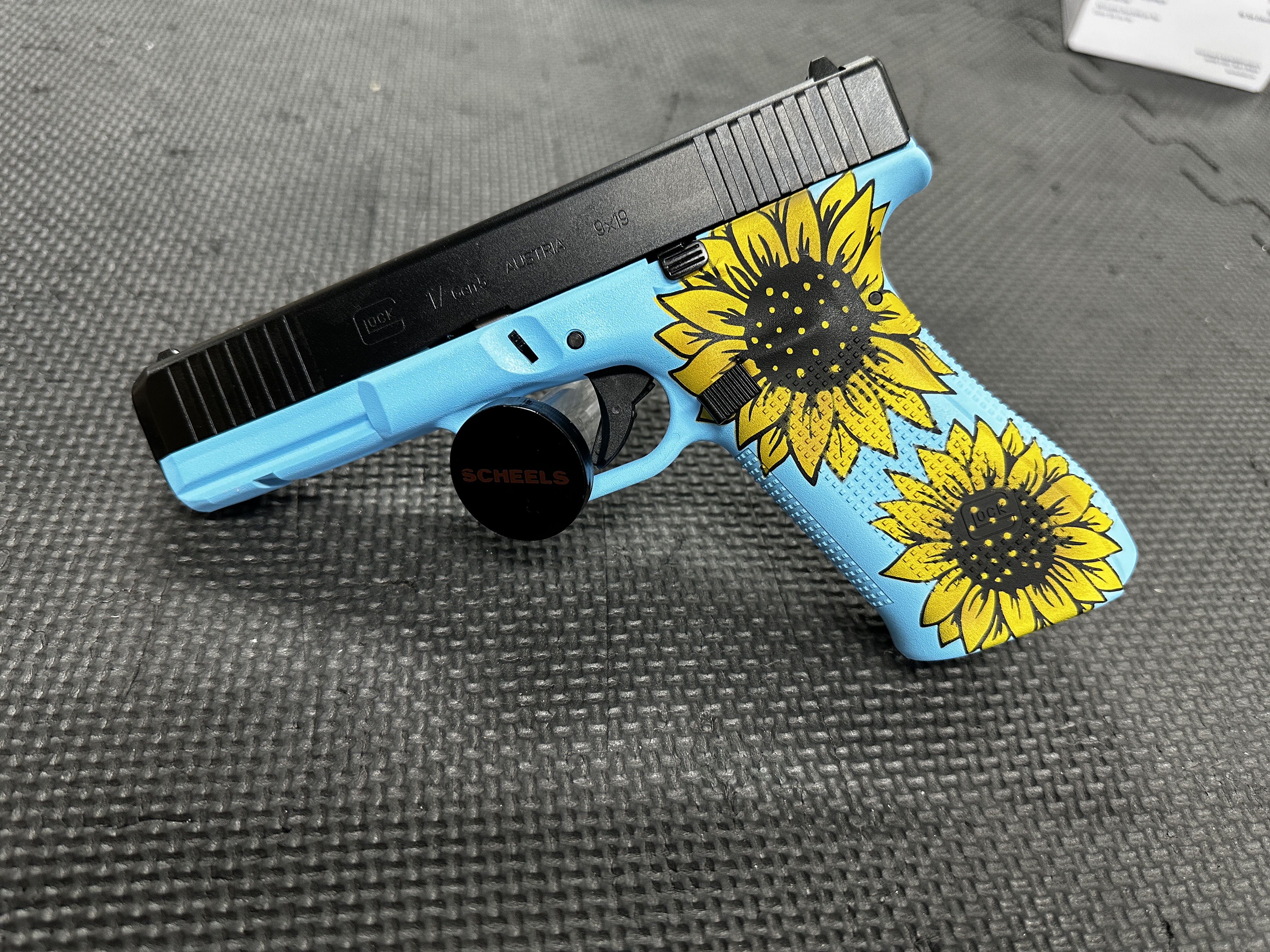 Blue Raspberry Cerakote Glock 17 finished in a Sunflower and Blue Raspberry Finish | Cerakote