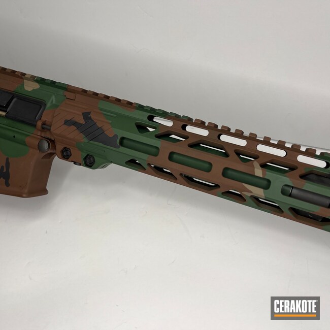 https://images.nicindustries.com/cerakote/projects/92806/cerakote-multicam-dark-brown-highland-green-graphite-black-and-magpul-flat-dark-earth-ar-15-build-1.jpg?1691187362&size=1024