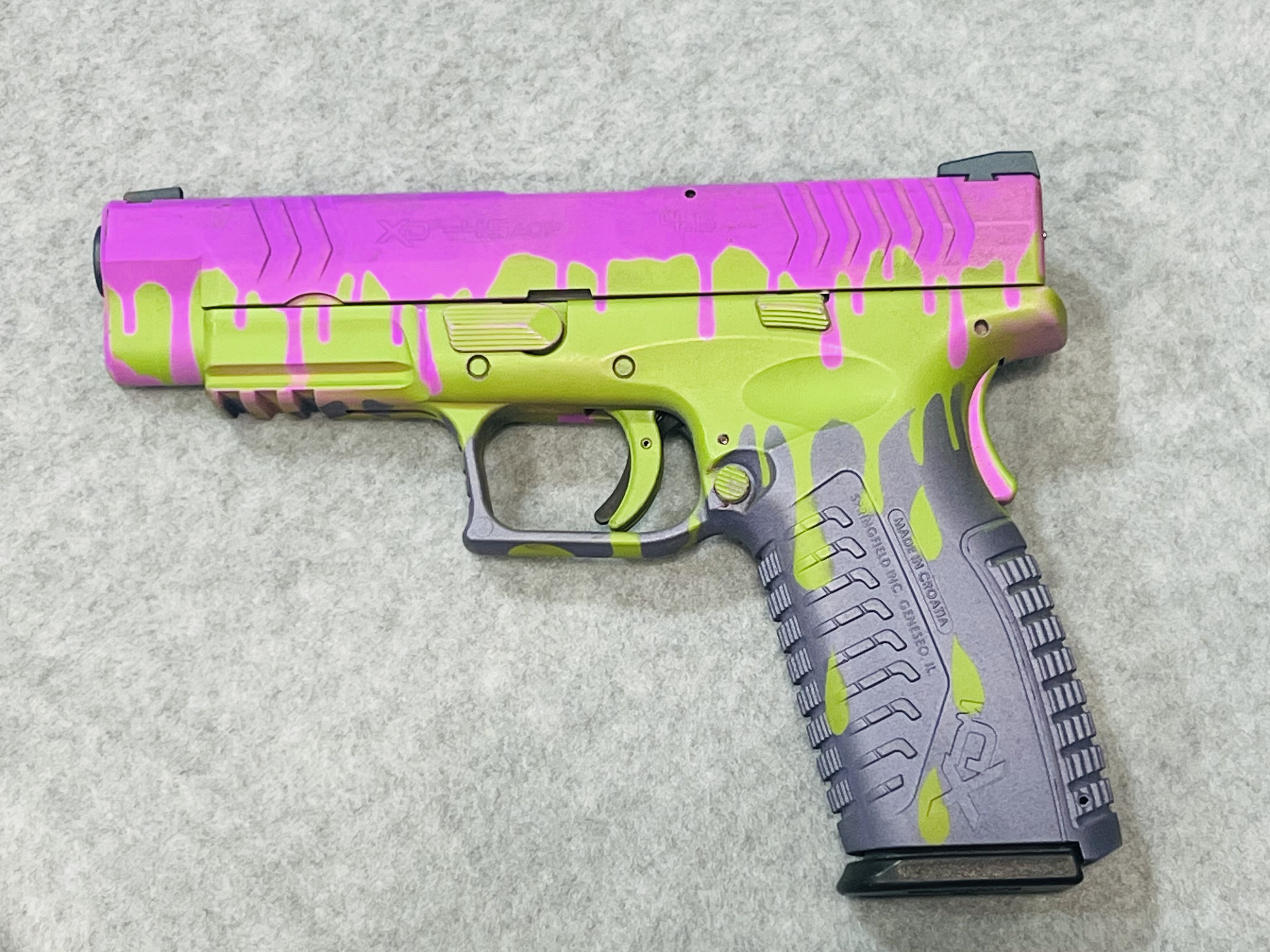 Glock 19 coated in a Zombie Green, Crushed Orchid and Purplexed Finish ...