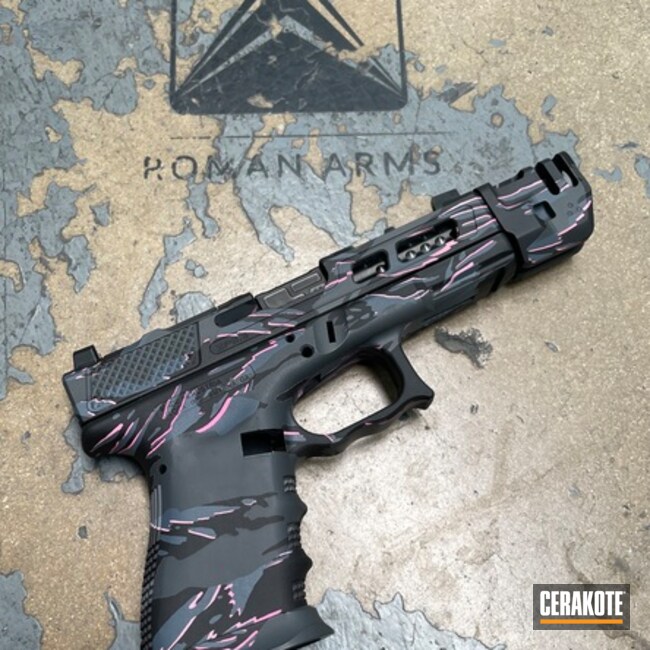 Custom Glock Coated With Cerakote In Bazooka Pink, Armor Black, Springfield® Grey, Prison Pink And Bull Shark Grey