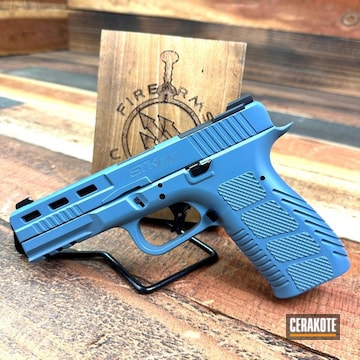 Rock Island Stk Coated With Cerakote In Armor Black And Robin's Egg Blue