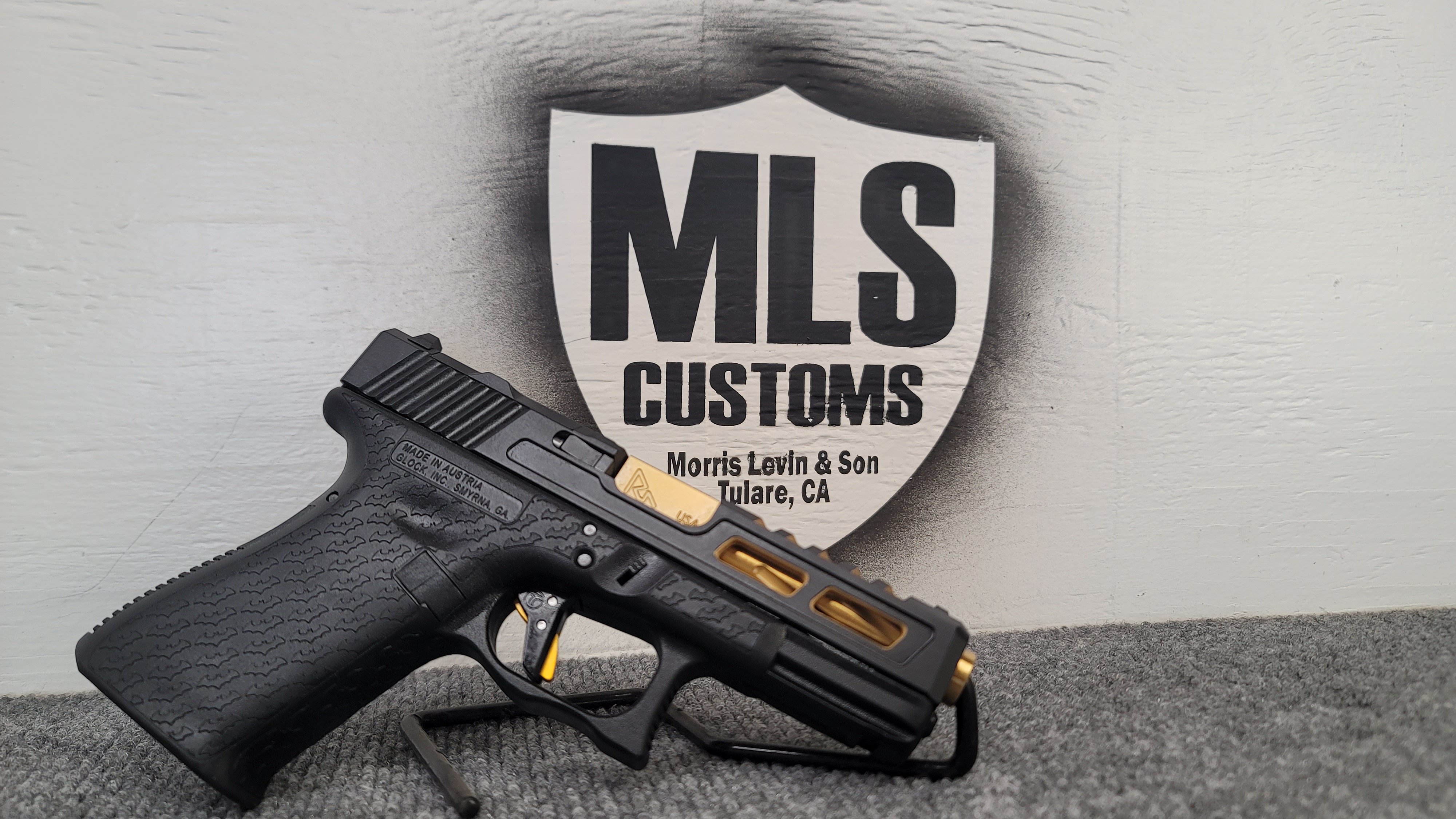Glock Coating Custom Glock done in a Armor Black and Gold Finish | Cerakote