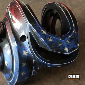 Distressed American Flag Theme Fishing Reel Coated With Cerakote In H-140, H-167, H-171 And H-146