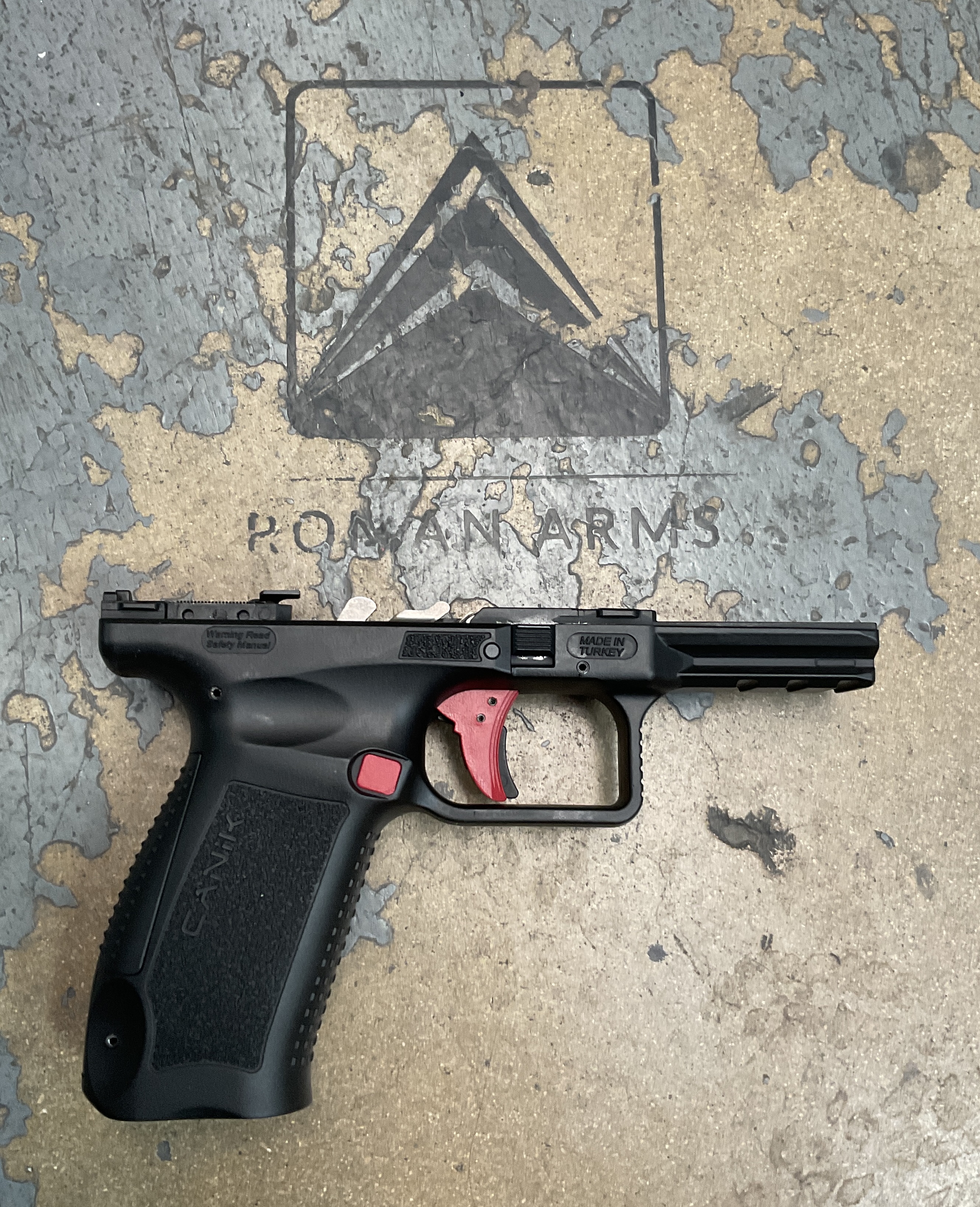 Ruby Pistal Canik Pistol Frame in Graphite Black and Ruby Red | Cerakote
