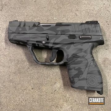 Taurus 709 Slim Coated With Cerakote In H-210 And H-146