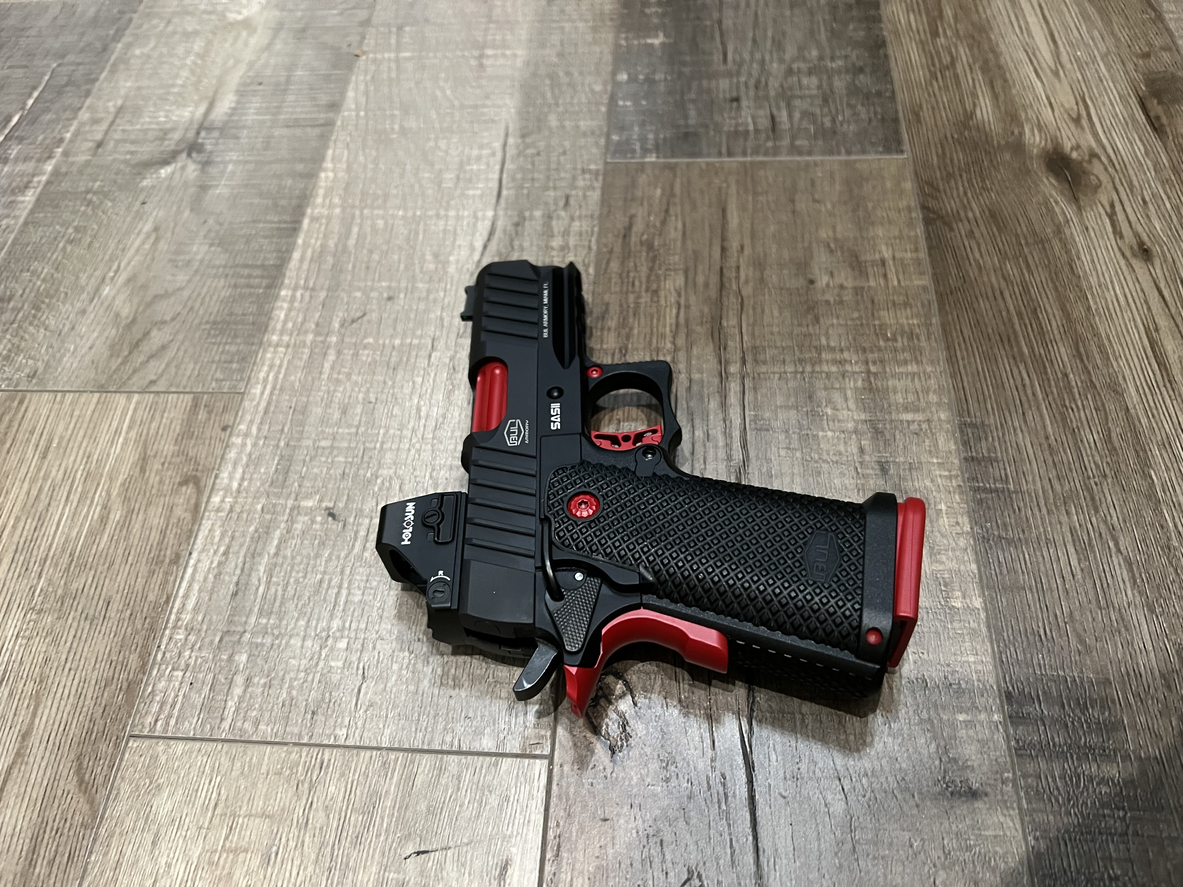 Pistol using Ruby Red | Cerakote