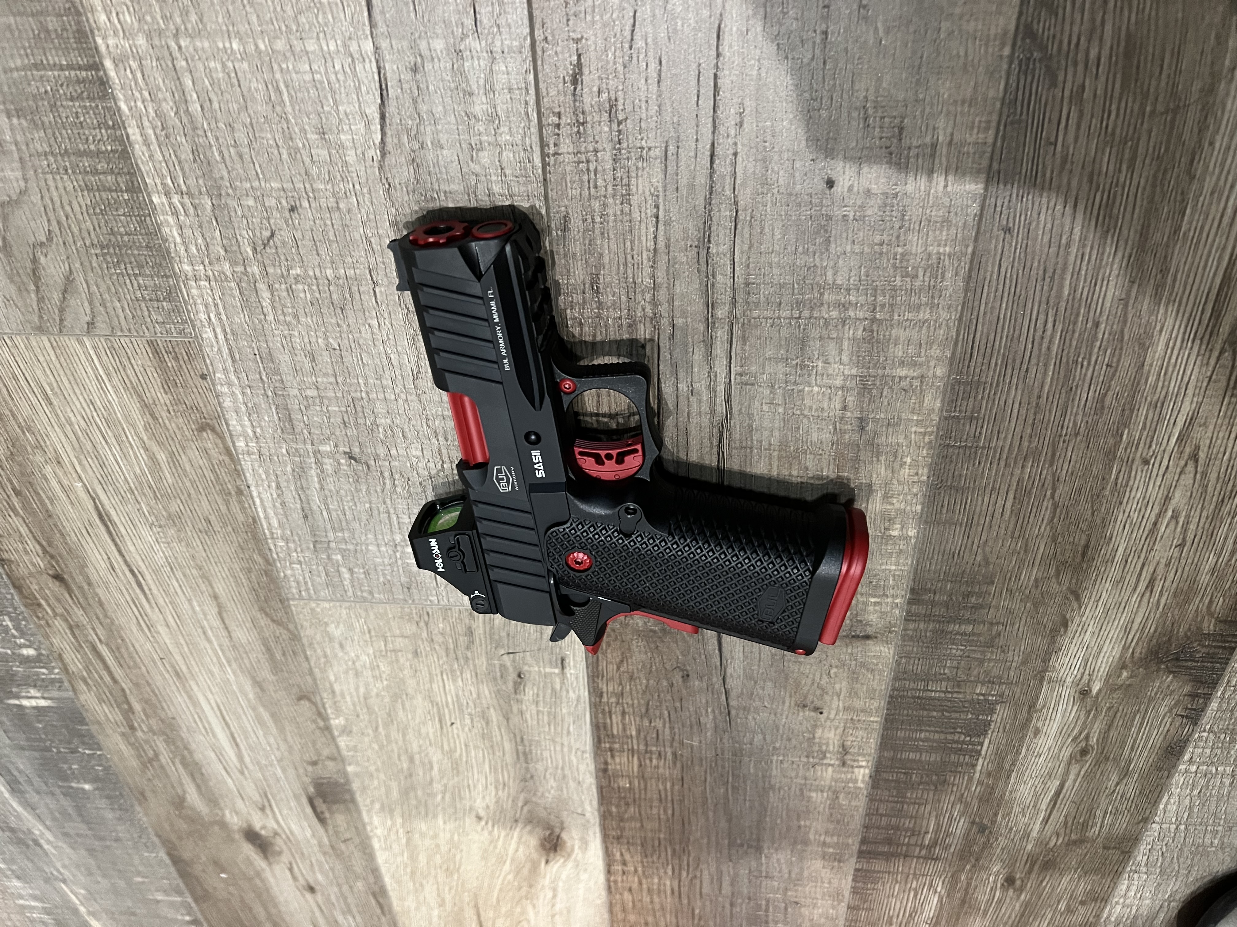 Pistol using Ruby Red | Cerakote