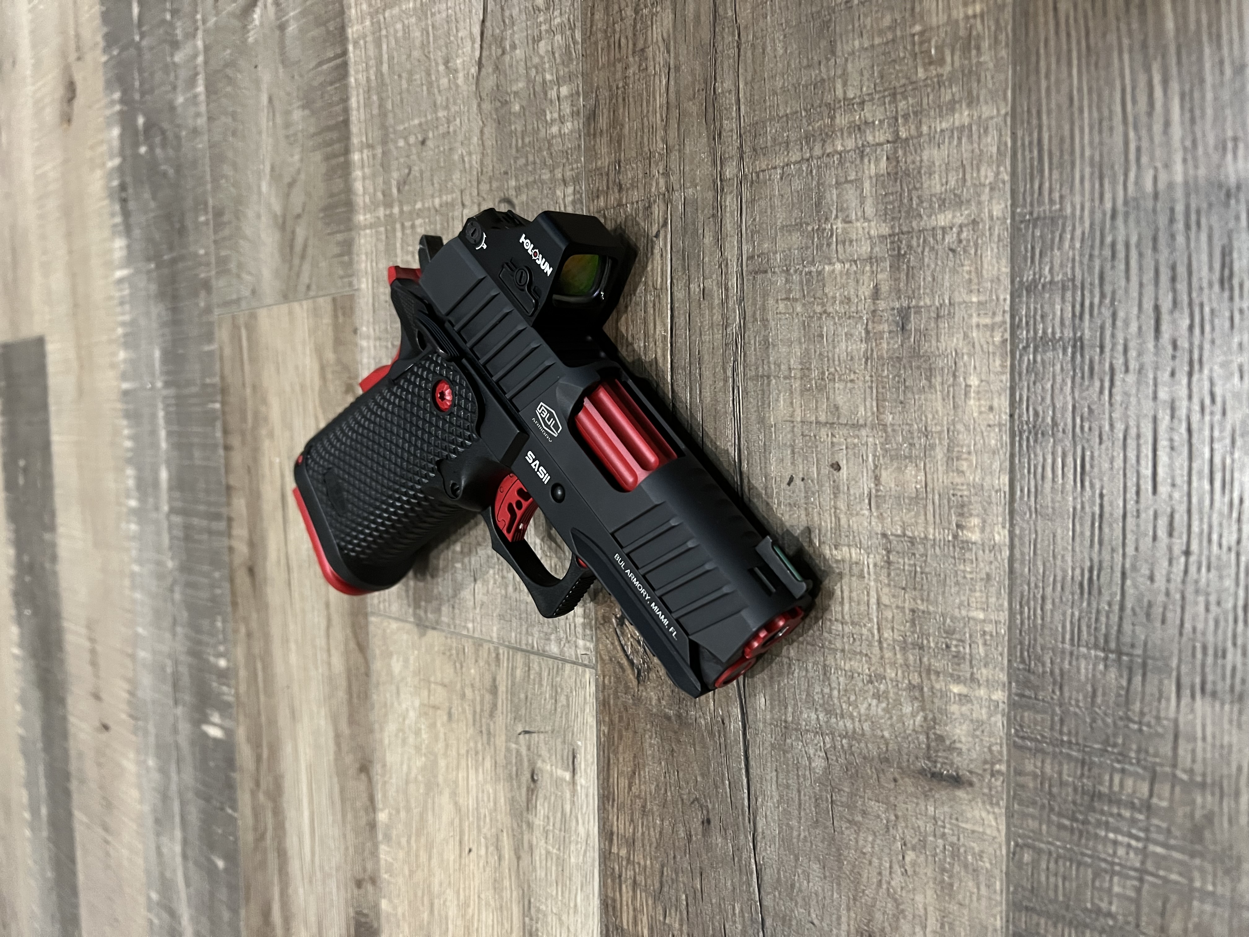 Pistol using Ruby Red | Cerakote