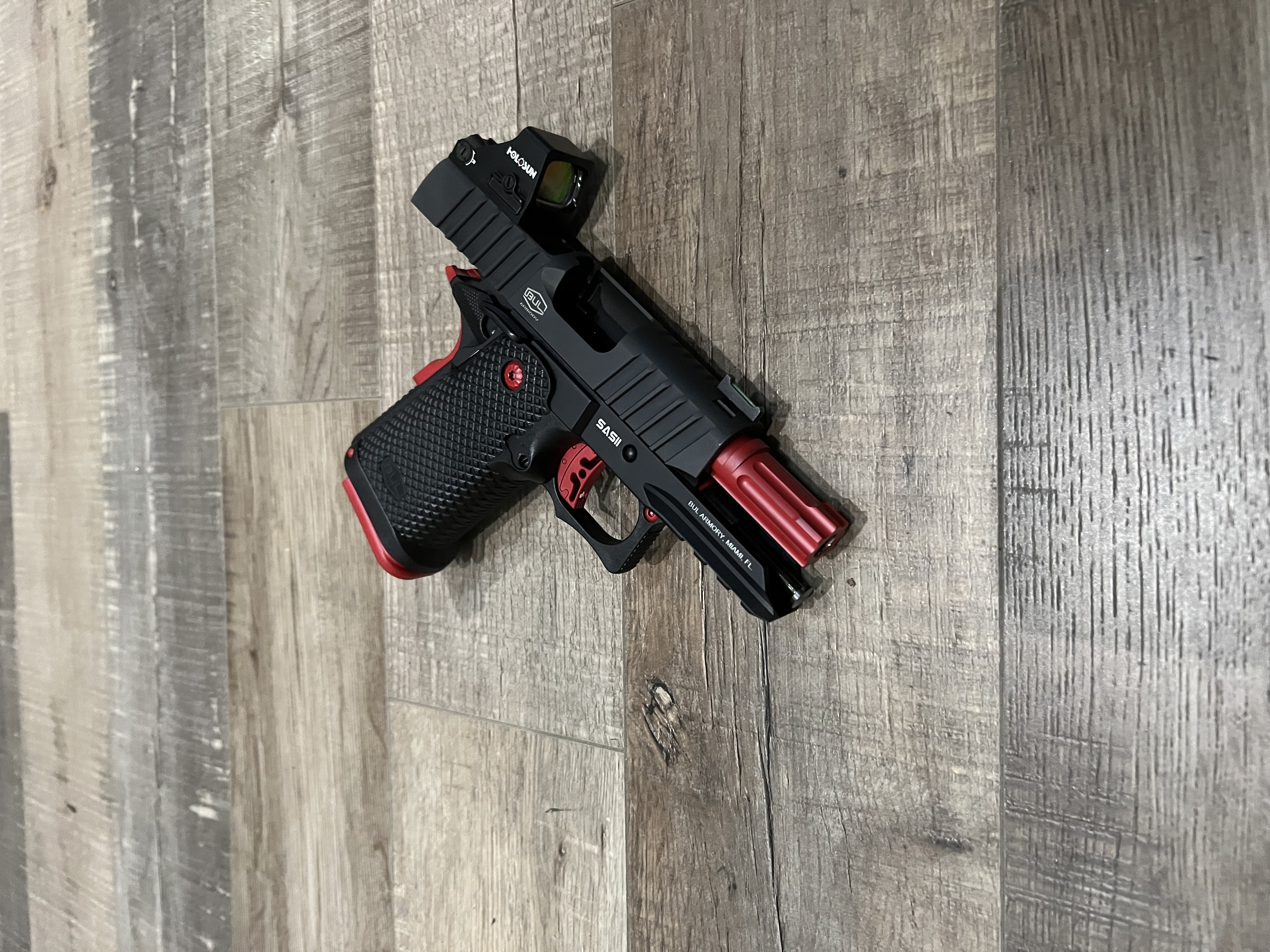 Pistol using Ruby Red | Cerakote