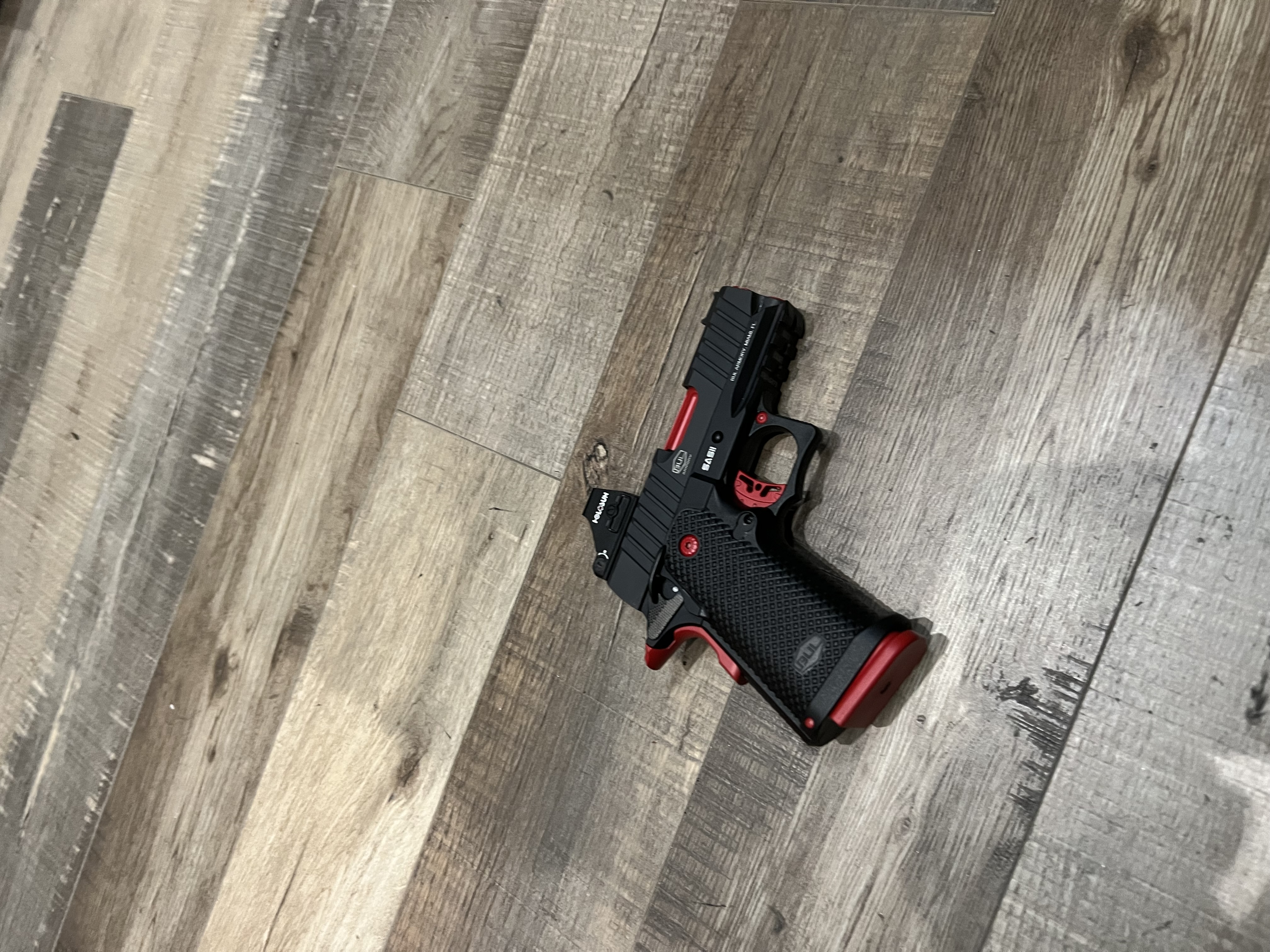 Pistol using Ruby Red | Cerakote