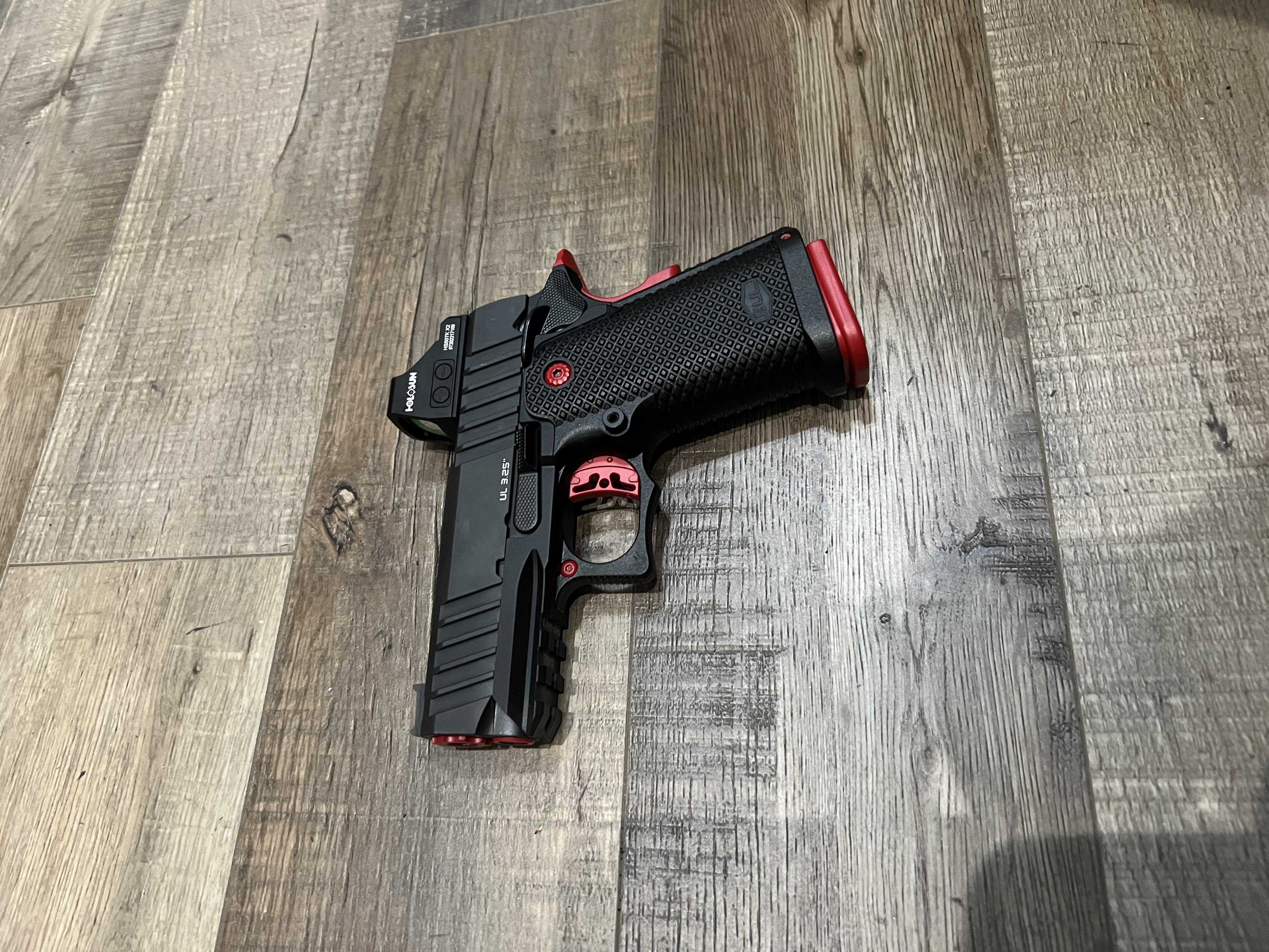 Pistol using Ruby Red | Cerakote