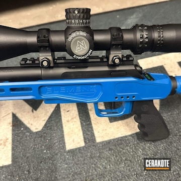 Hunting Rifle Coated With Cerakote In Nra Blue And Graphite Black