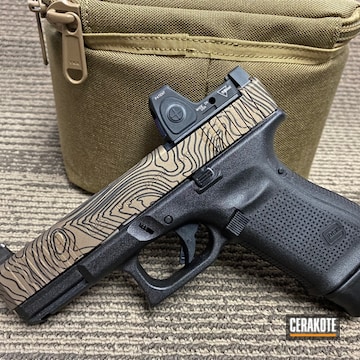 Custom Glock With Topo Coated With Cerakote In Smoked Bronze And Graphite Black