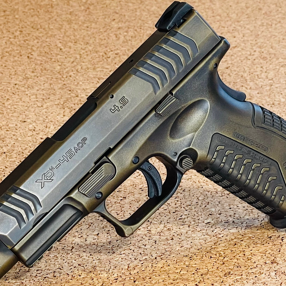 Battle-worn Springfield XDM in Burnt Bronze | Cerakote