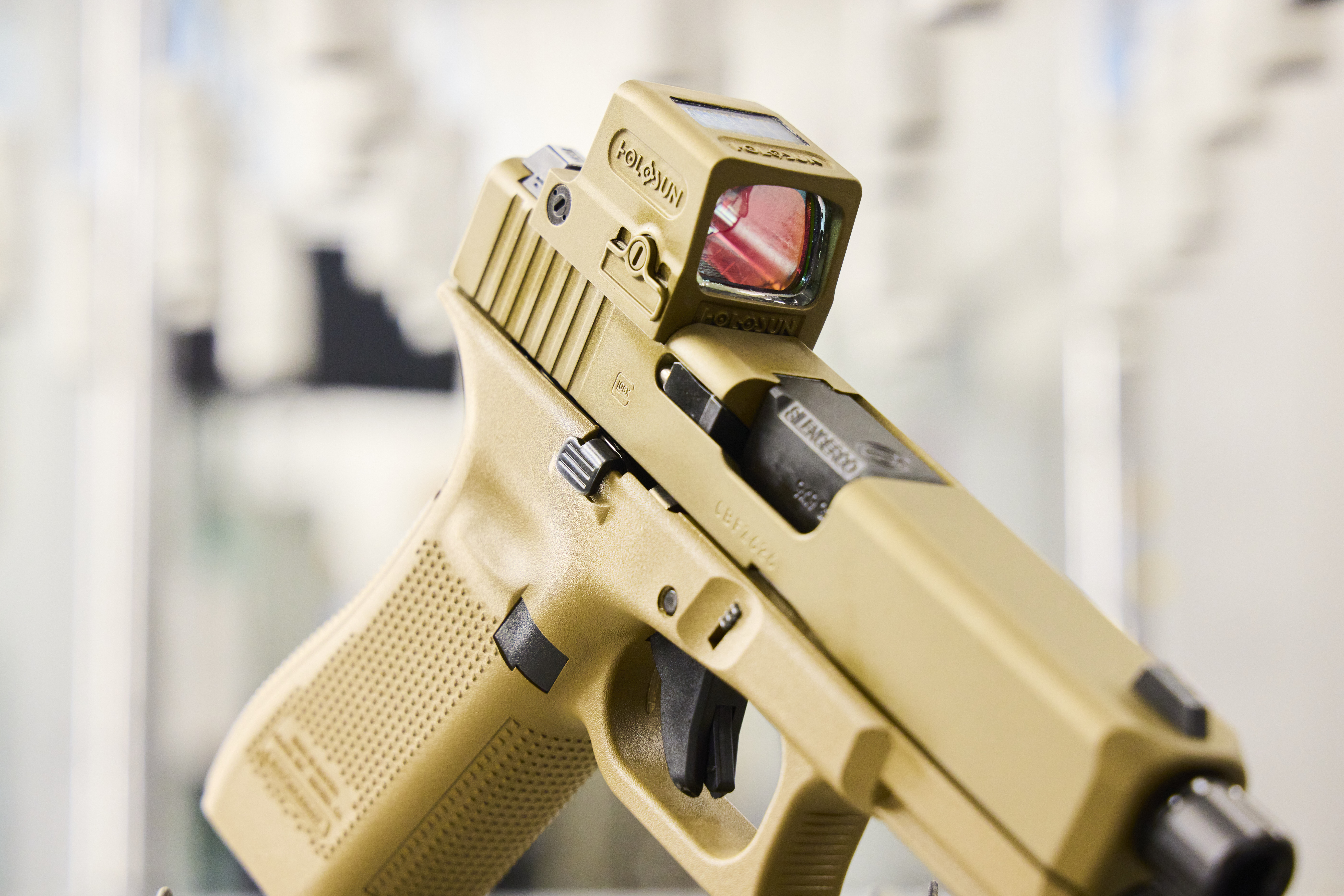 Glock Coating Custom glock coated in Burnt Bronze and matching holosun optic | Cerakote